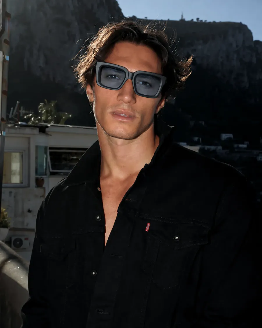 Sam Carbon with blue lenses, worn outdoors