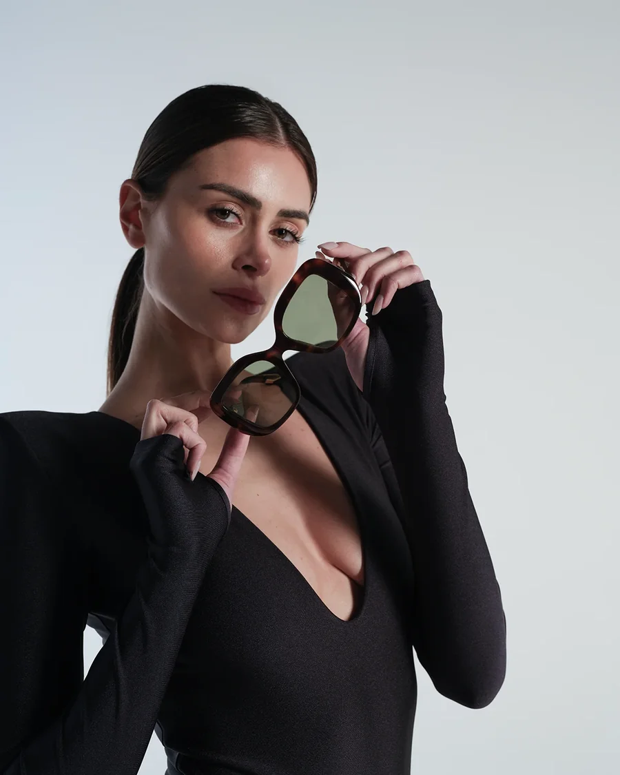 Tempest Havana, the frame held in hand in the studio